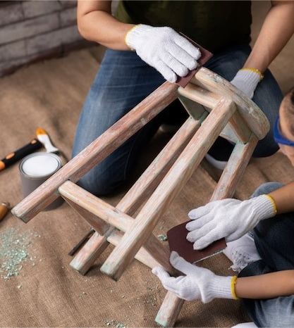 Sanding down a chair